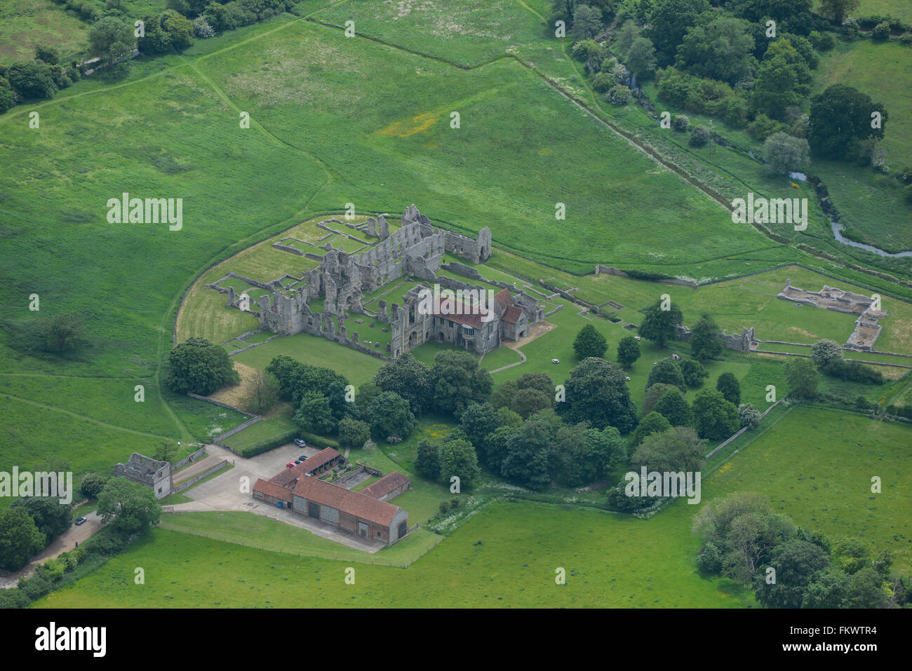 An aerial view of the ruins of Castle Acre Priory in Norfolk Stock Photo