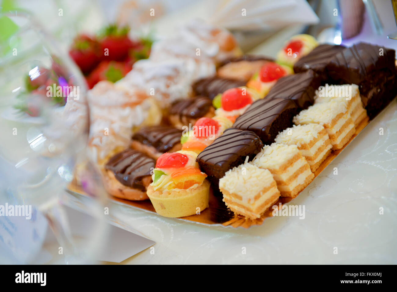 Lots of chocolate and vanilla cakes Stock Photo