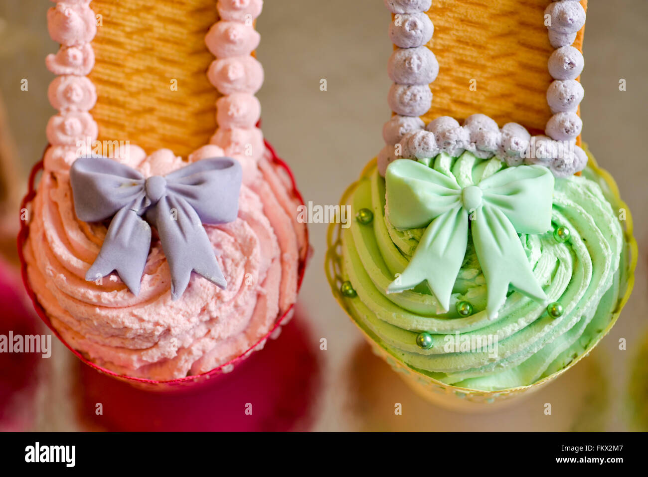 Cake pink and green with bow Stock Photo