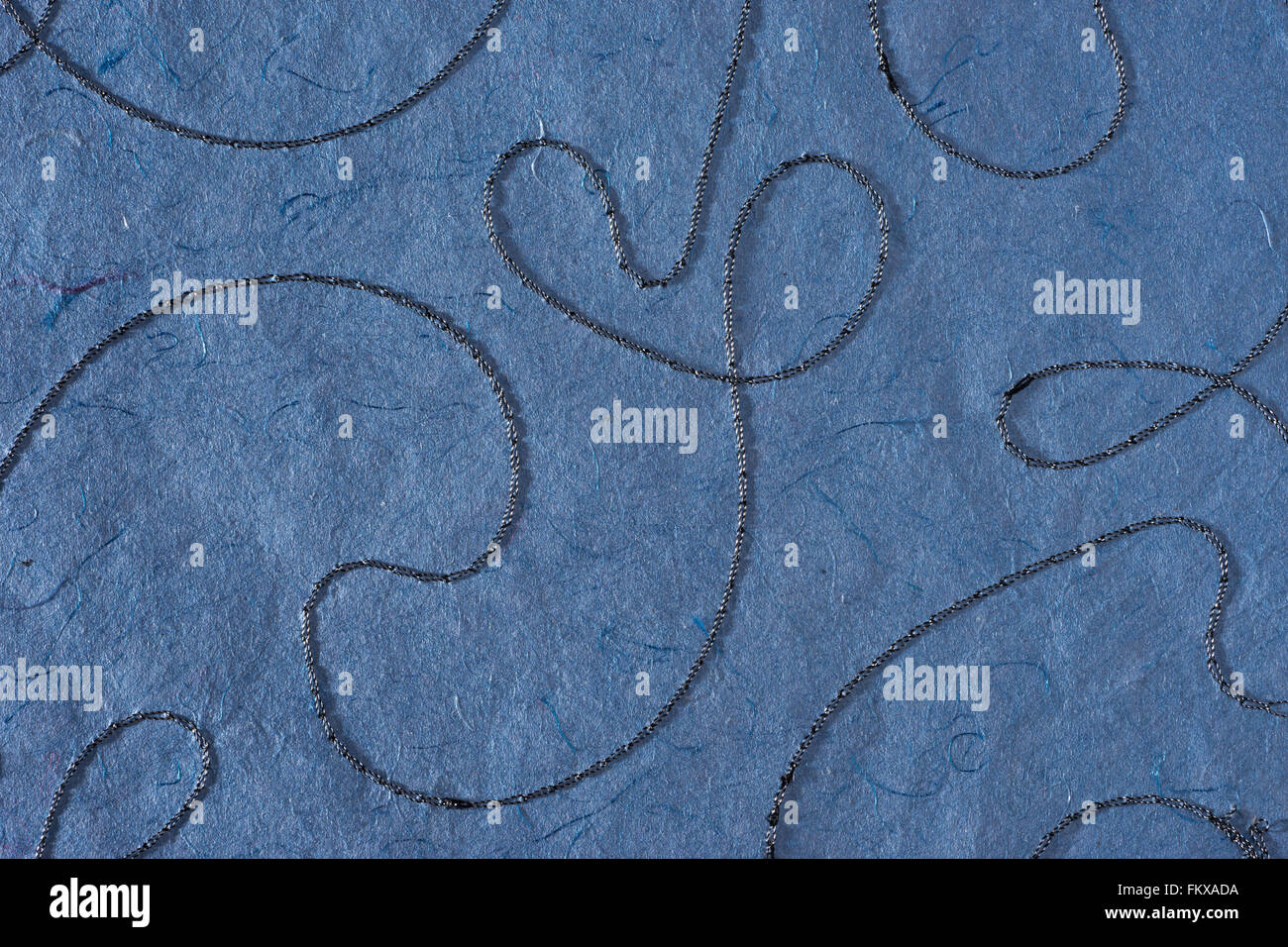 Blue paper texture background. Waves shapes stitched pattern. Like self made paper sheet Stock Photo
