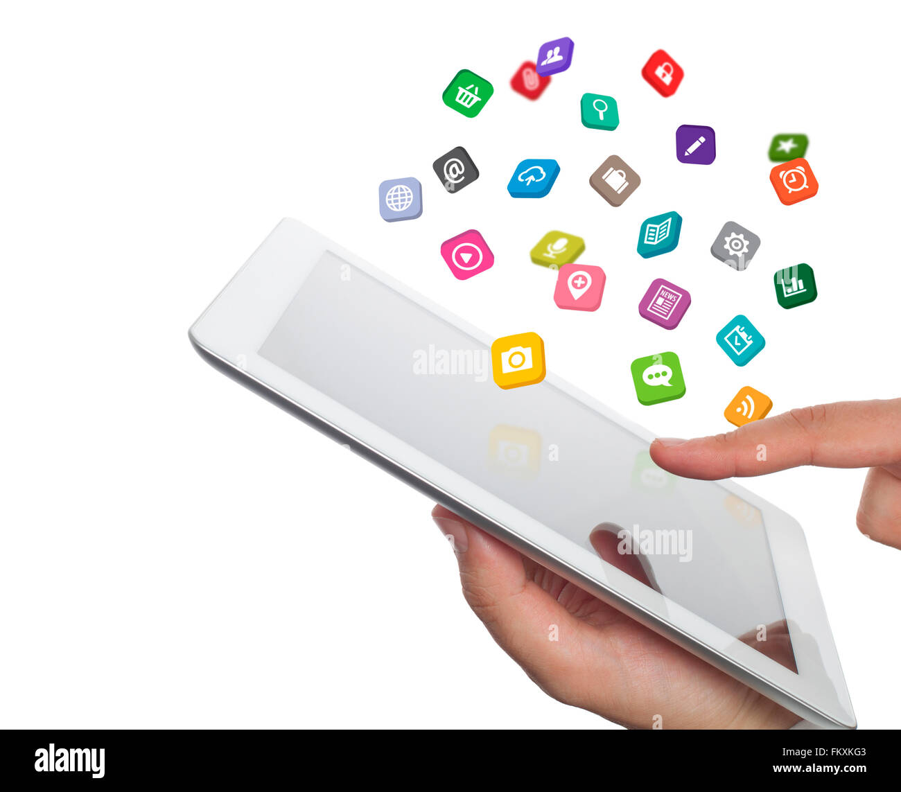 colorful application icons fly off the tablet computer screen Stock Photo