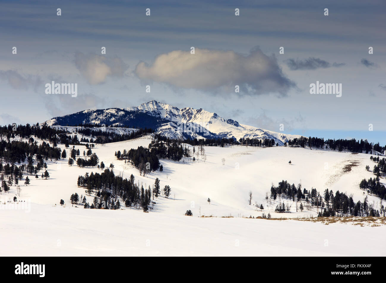 Snow covered mountain ridge dramatic hi-res stock photography and ...