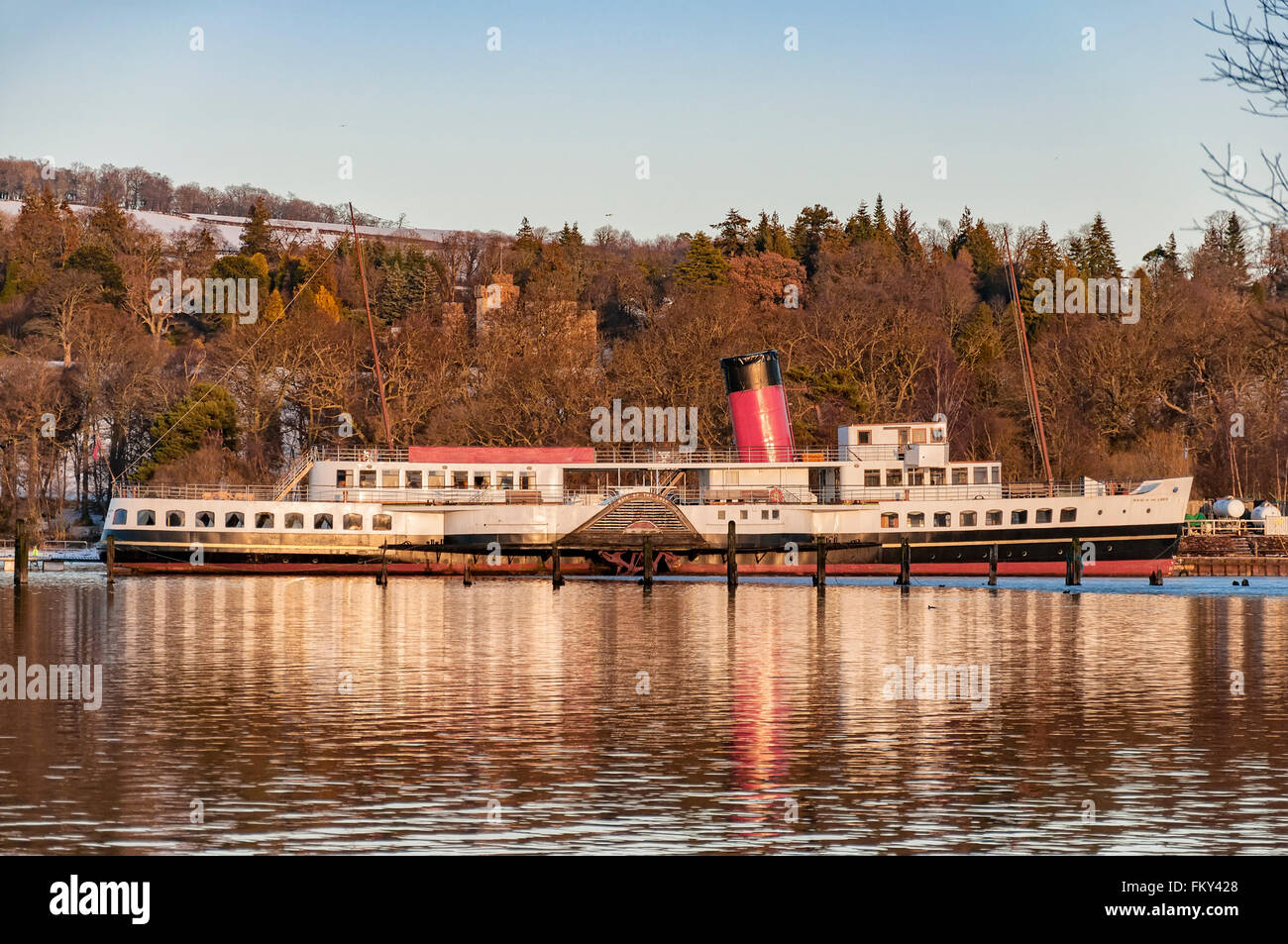 A view of the maid of the loch paddle steamer from across loch lomond near the scottish town of balloch. Stock Photo