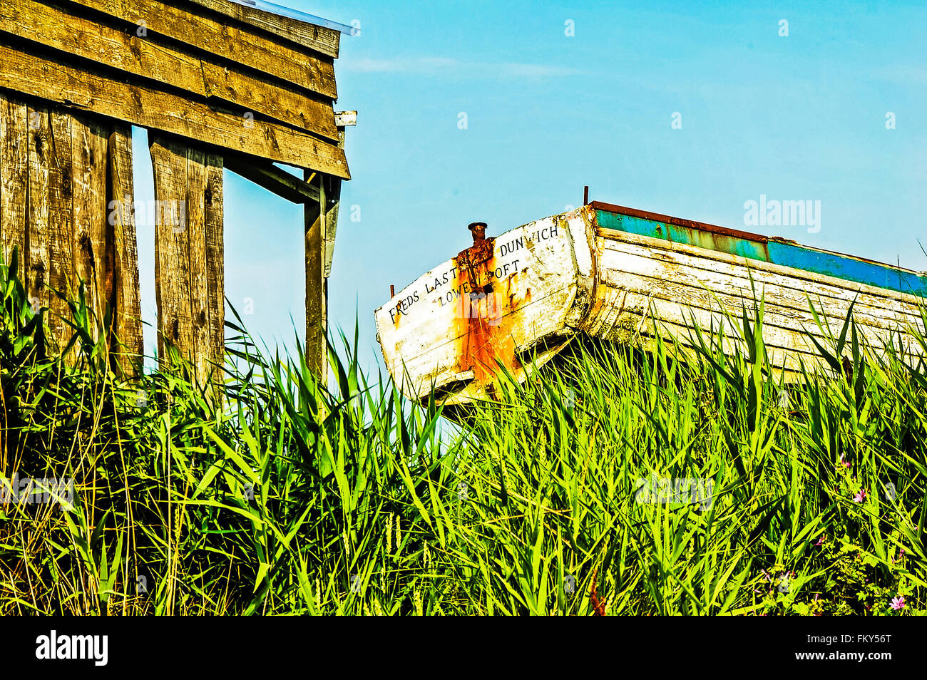 A boat on shore; ein altes Ruderboot am Strand Stock Photo