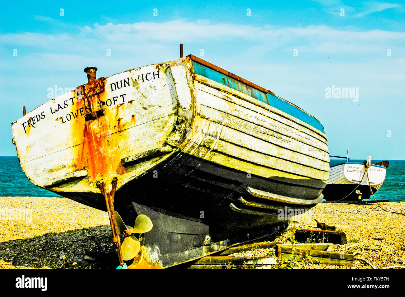 A boat on shore; ein altes Ruderboot am Strand Stock Photo
