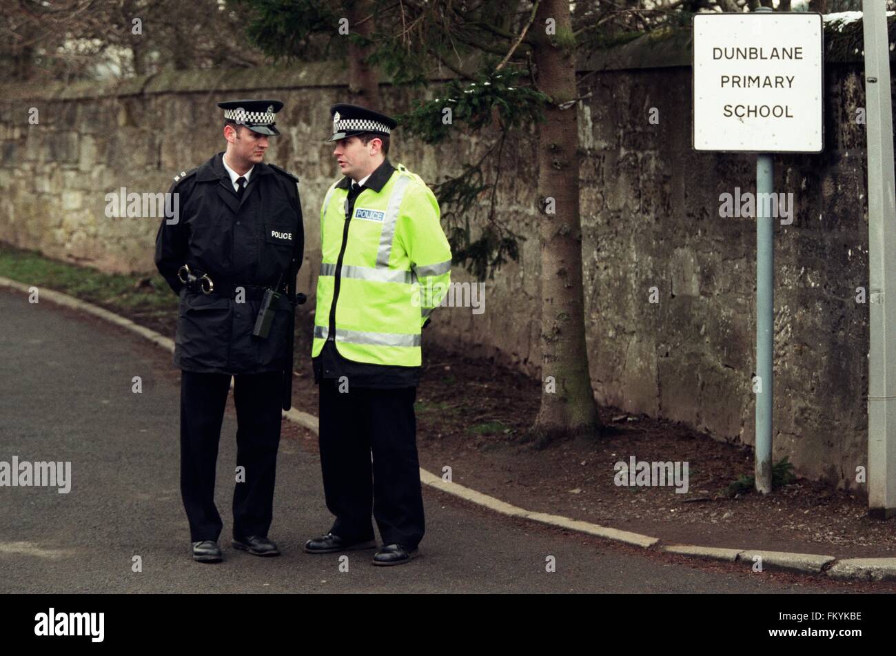 Two police officers on guard outside Dunblane primary school, Scotland