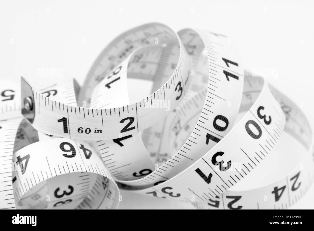 Closeup of coiled measuring tape Stock Photo Alamy