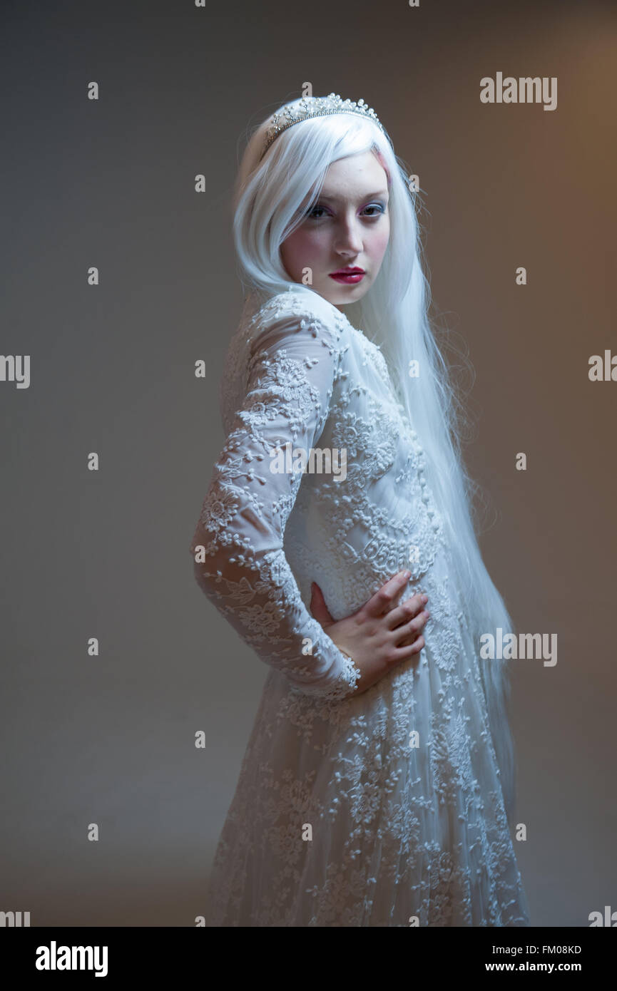 Side view portrait from chest with white hair and dress Stock Photo