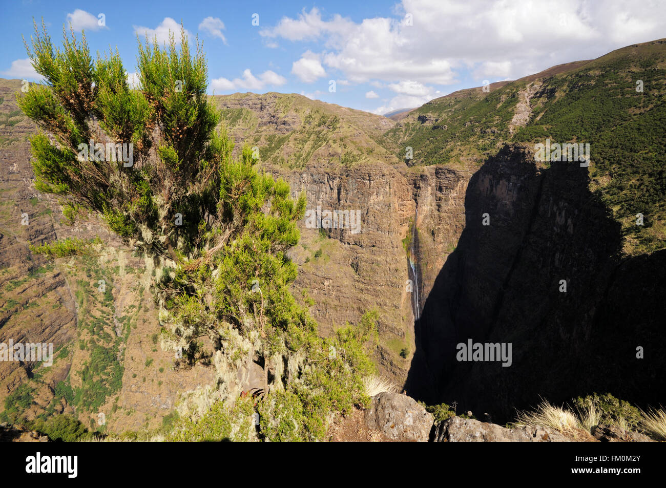 Small waterfall (Jinbar Falls) at the Geech Abyss in dry season, Simien Mountains National Park, Amhara Region, Ethiopia Stock Photo