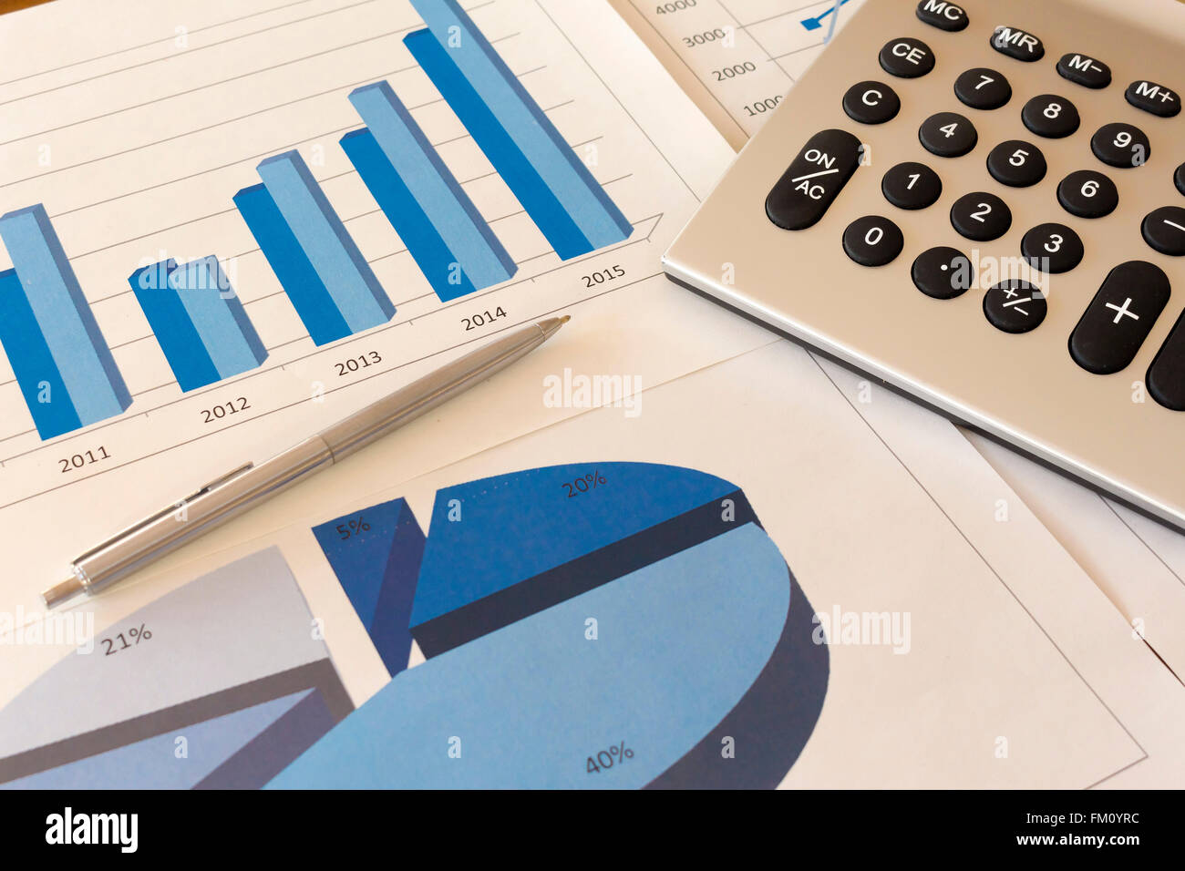 office desk with charts , histograms and financial documents Stock Photo