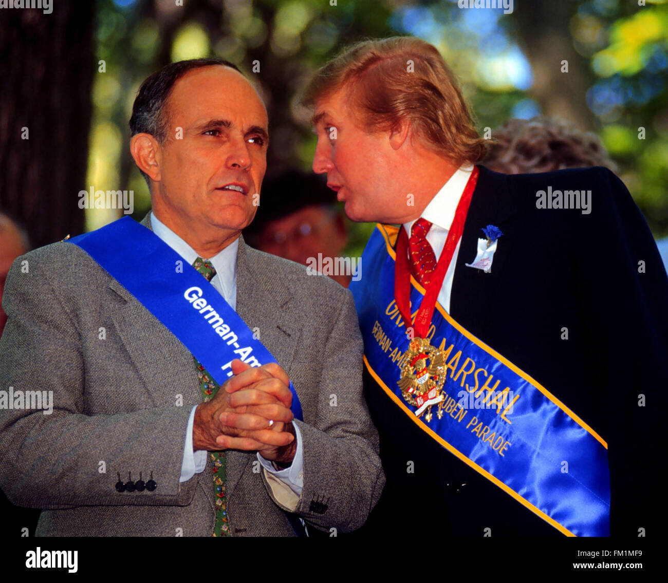 NYC Mayor Rudy Giuliani (L)  and Real Estate Developer Donald Trump (R) at the reviewing stand in the 42nd Annual Steuben Day Parade on September 18, 1999. Mr. Trump, who was Grand Marshal,  has been proposed as a possible candidate for Vice President in the Reform Party, running with Pat Buchanan and Mayor Giuliani is a candidate for Senate in the Rpublican Party.  (© Richard B. Levine) Stock Photo