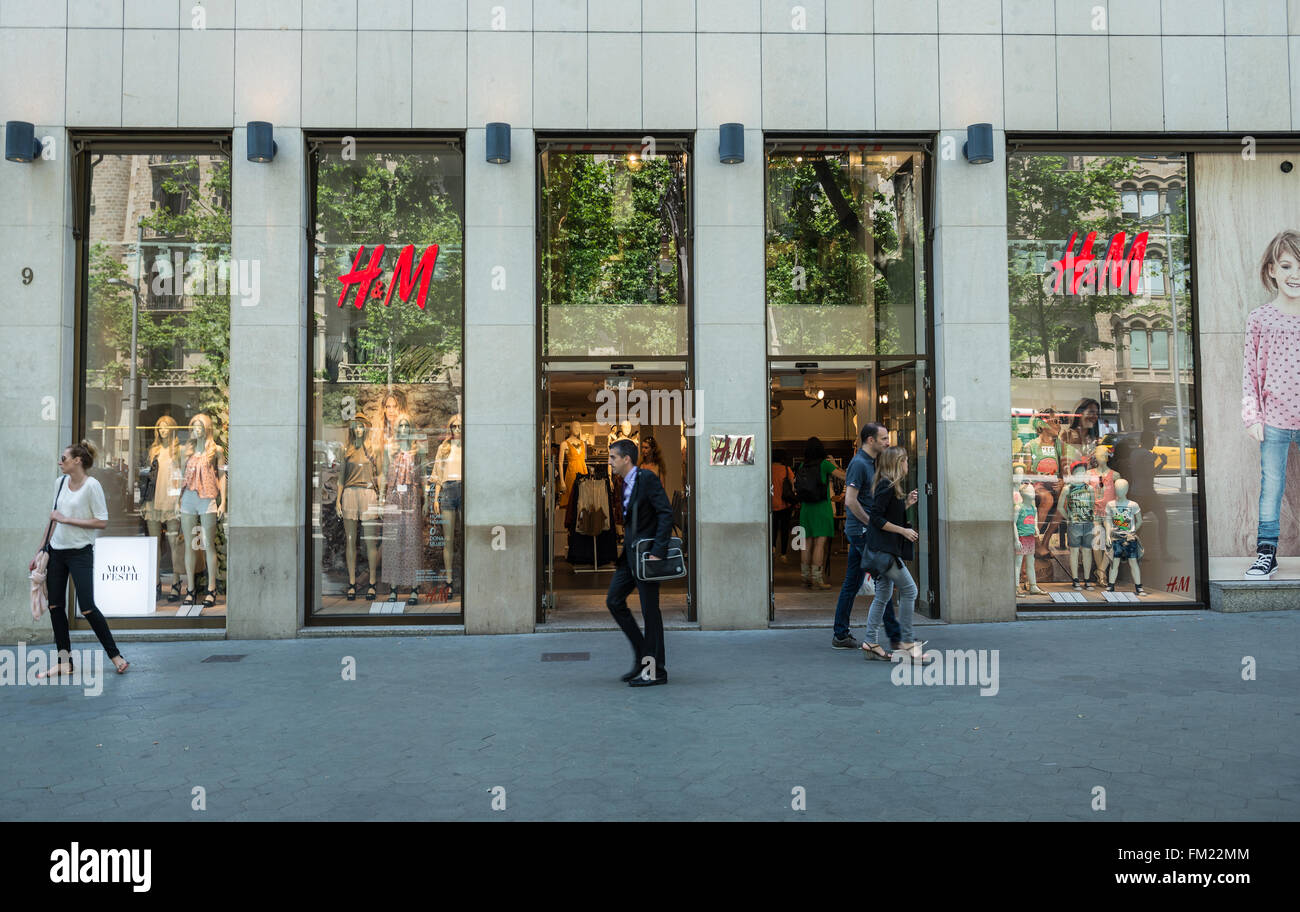 H&M store at Passeig de Gracia avenue in Barcelona, Spain Stock Photo