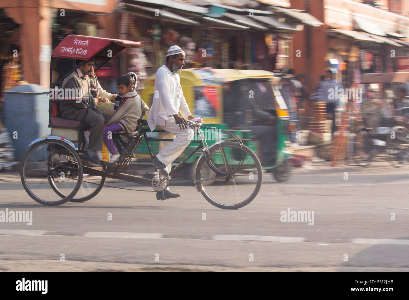 Agra india bicycles blur rickshaw hi-res stock photography and images ...
