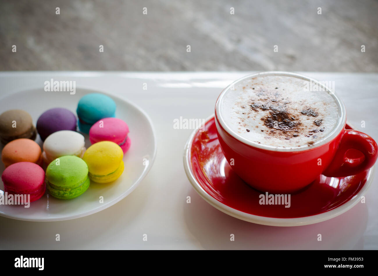 Cup of hot coffee and macaroons Stock Photo