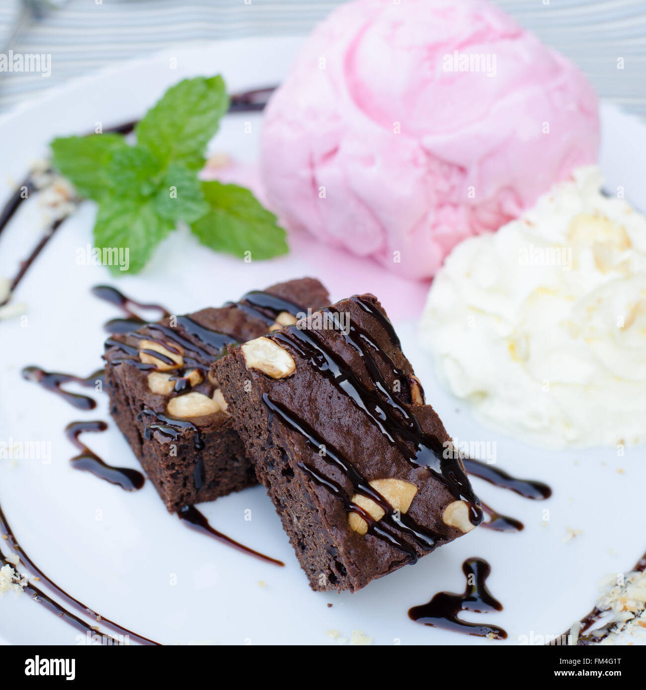 Cake chocolate brownies on ice cream Stock Photo Alamy