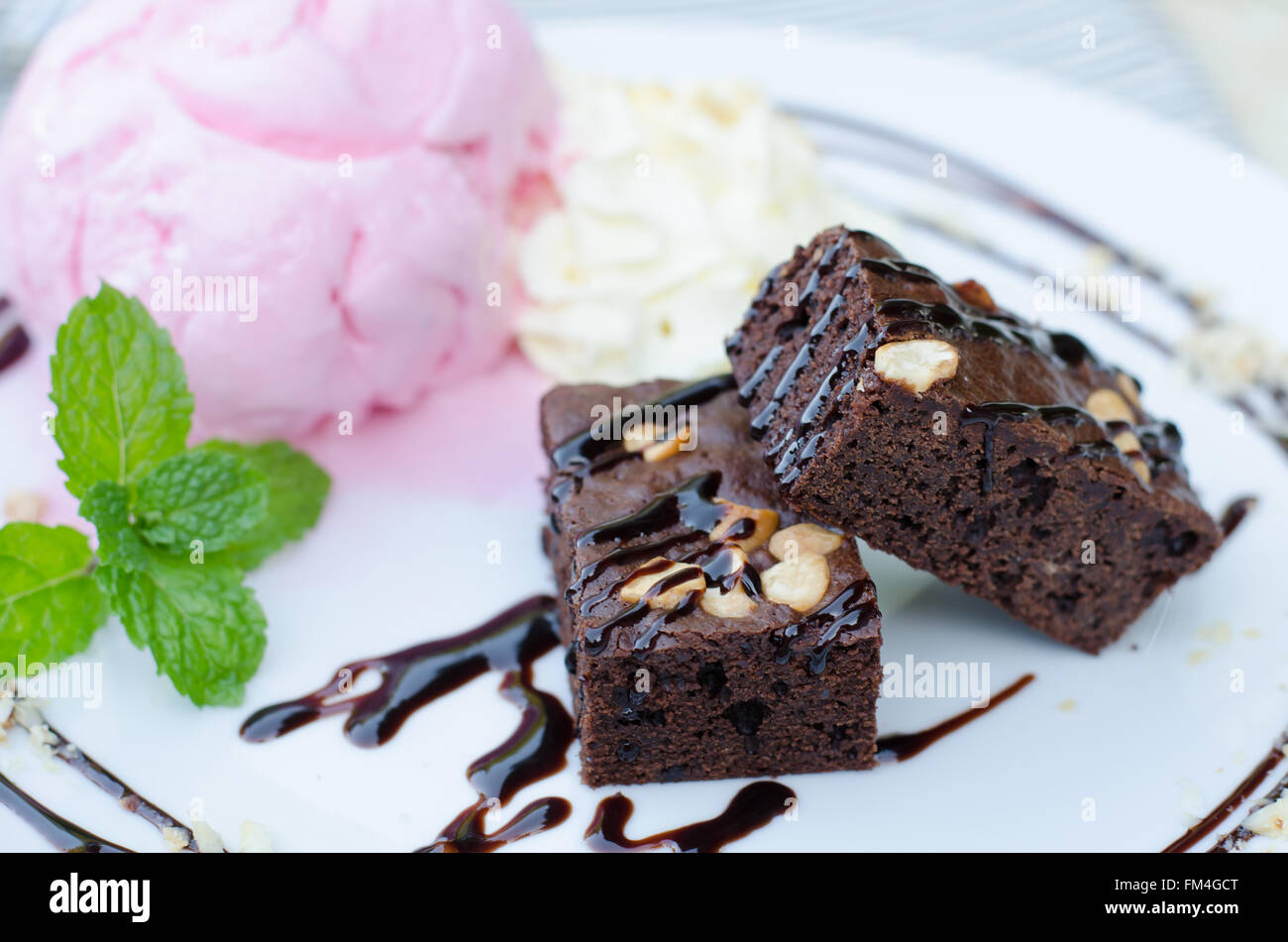 Cake chocolate brownies on ice cream Stock Photo