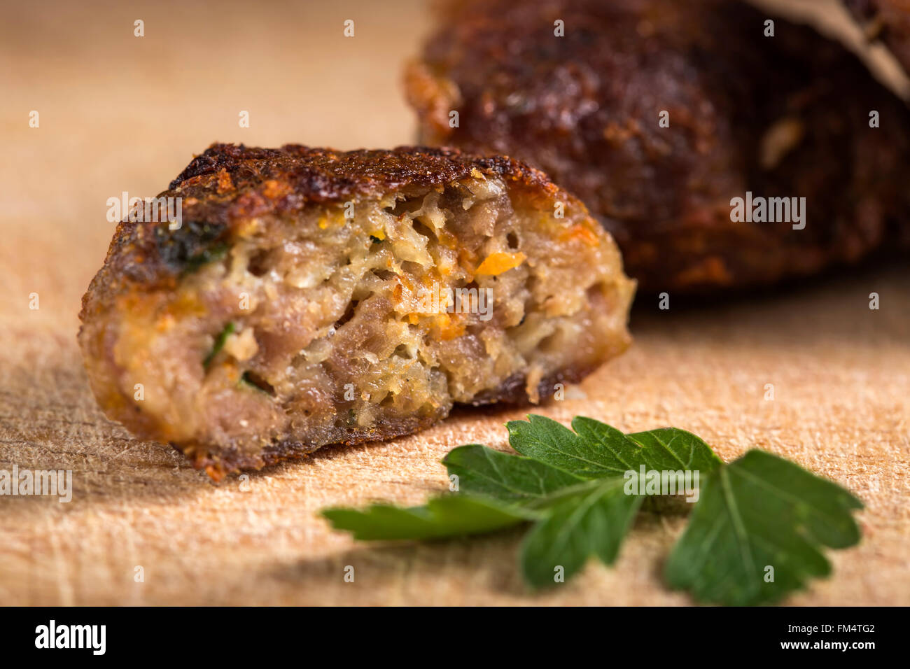 Close up of Romanian meatballs called 'chiftele' made with minced meat and parsley Stock Photo