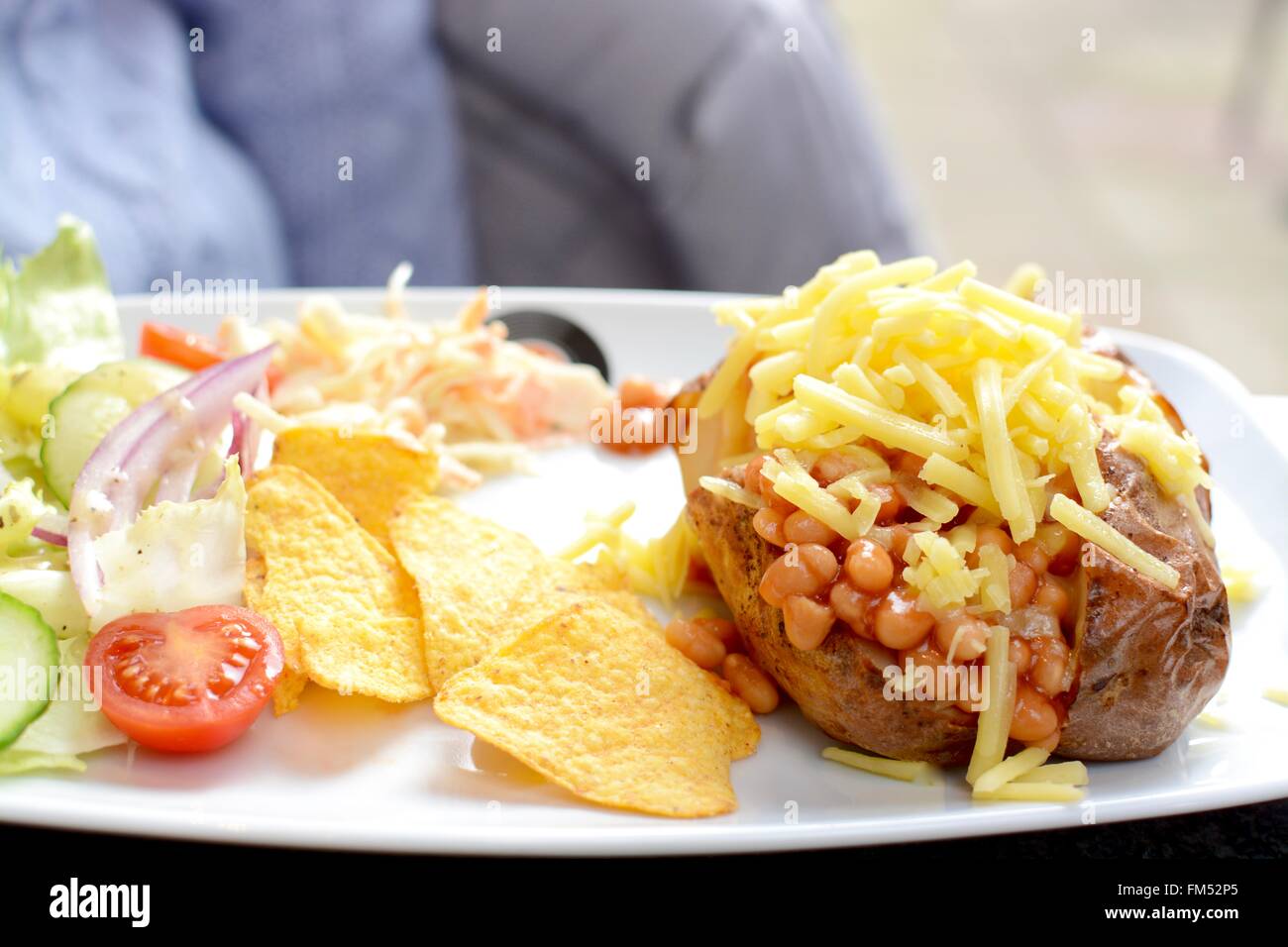 Jacket Potato with Beans and Salad Stock Photo Alamy