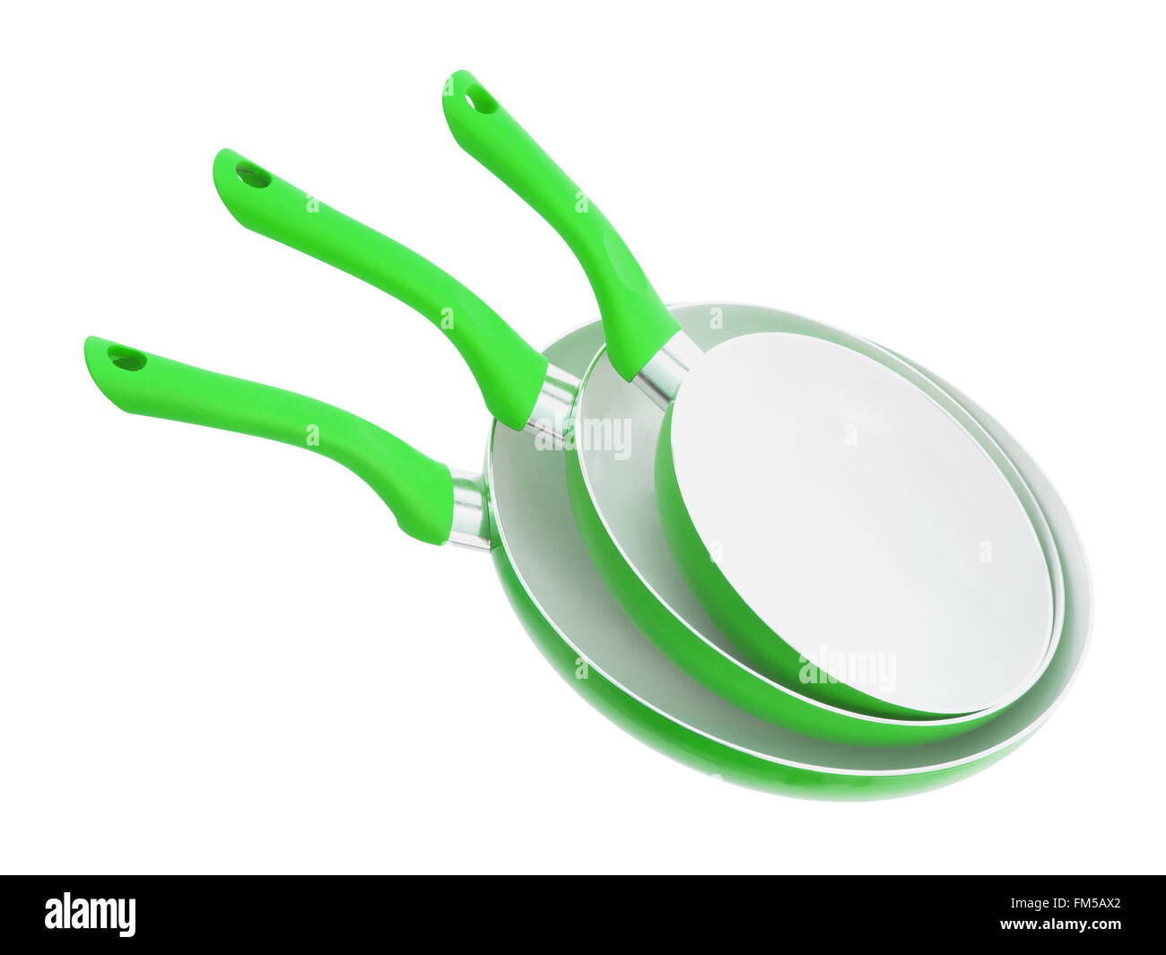 Set of three frying pans, isolated, close-up, green Stock Photo