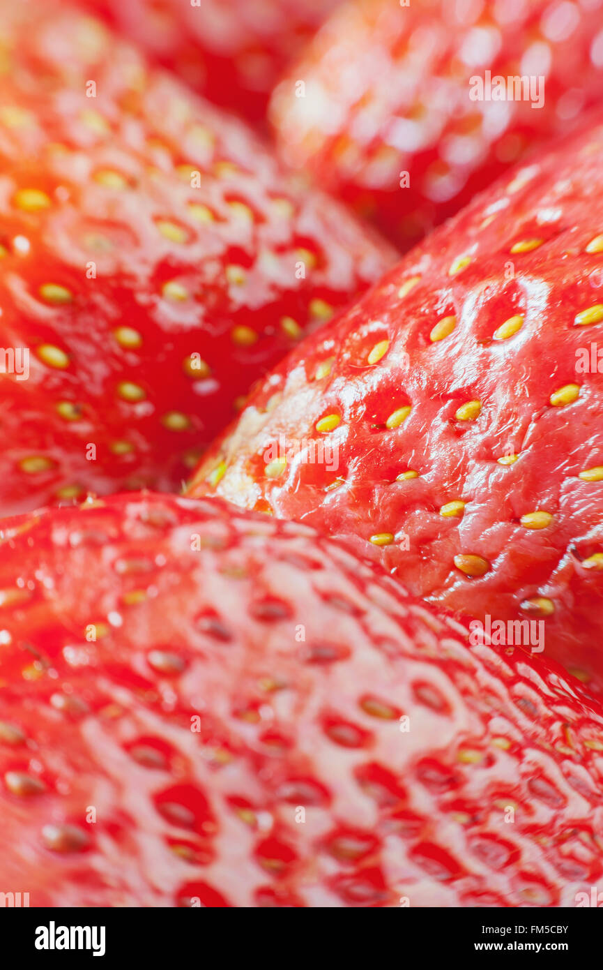 Macro fresh strawberry blurred background Stock Photo - Alamy