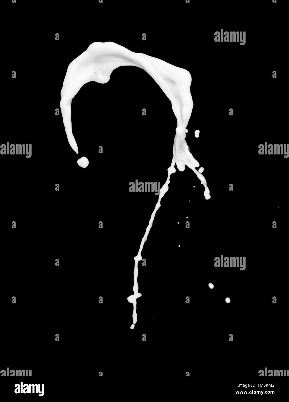 milk or white liquid splash isolated on black background Stock Photo