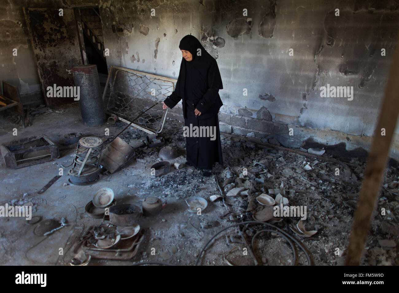 IS fighters destroyed this house because the house owner is Shia muslims Stock Photo