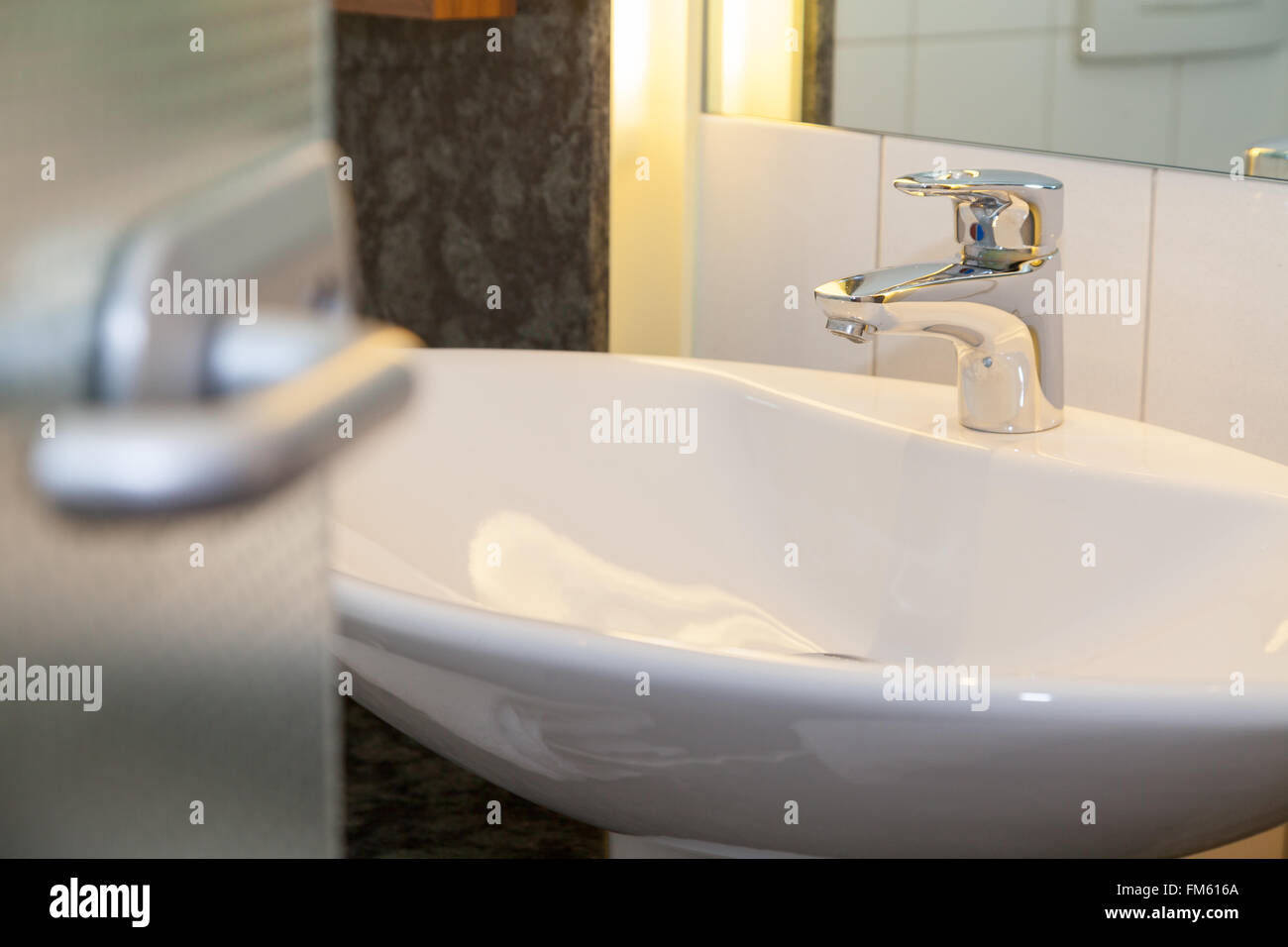 bathroom with white lavatory in a house Stock Photo