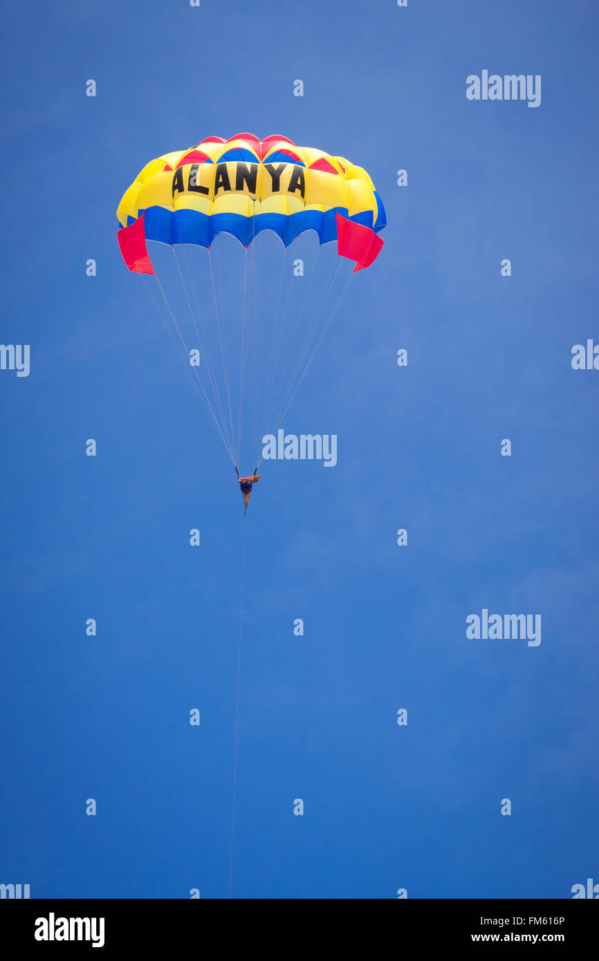 KEMER, TURKEY - MAY 23, 2013: Skydiver against the sky, over the black sea in Turkey. parachutist in the air wing's flying Stock Photo