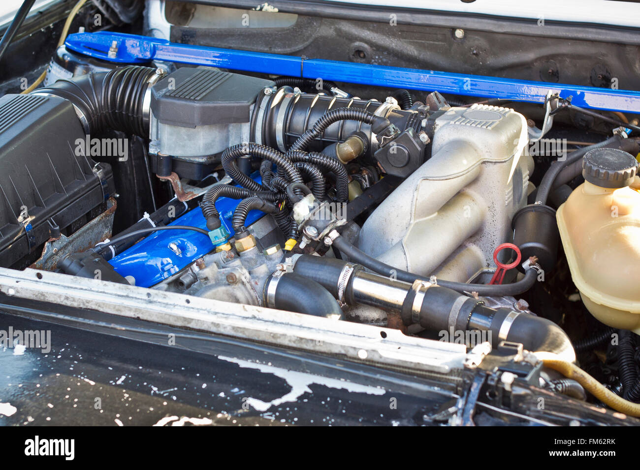 SAINT-PETERSBURG, RUSSIA - AUGUST 3, 2013: Engine of the old-car BMW at the meeting, fans of the Bavarian automaker Stock Photo