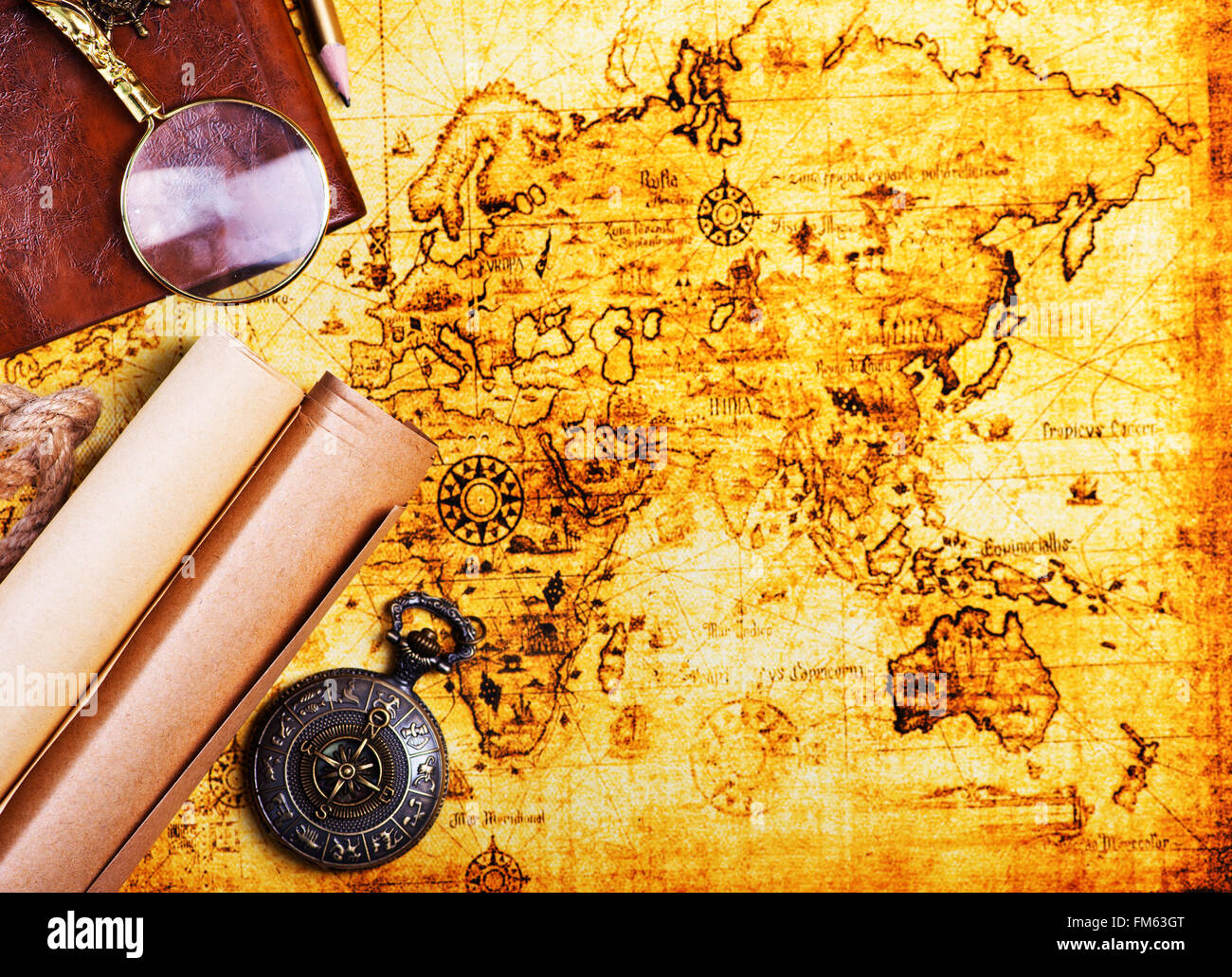 old notebook, loupe and compass on the map Stock Photo - Alamy