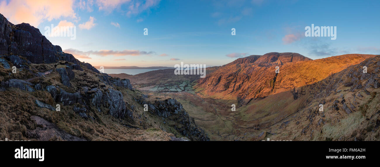 Dawn light over Coomgira and Hungry Hill, Beara Peninsula, County Cork, Ireland. Stock Photo