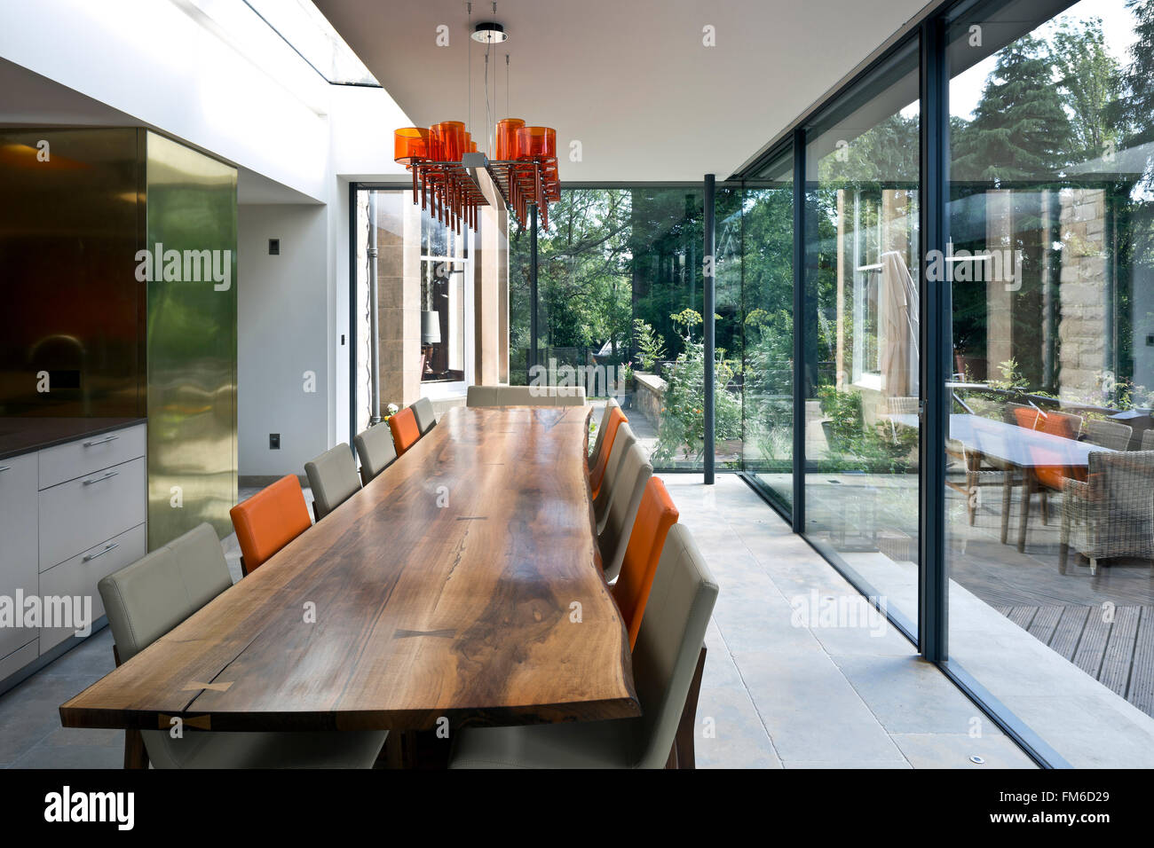 An interior view of an ultra modern residential building showing the modern  interior design, and the large dining space Stock Photo - Alamy, image size:1300x956