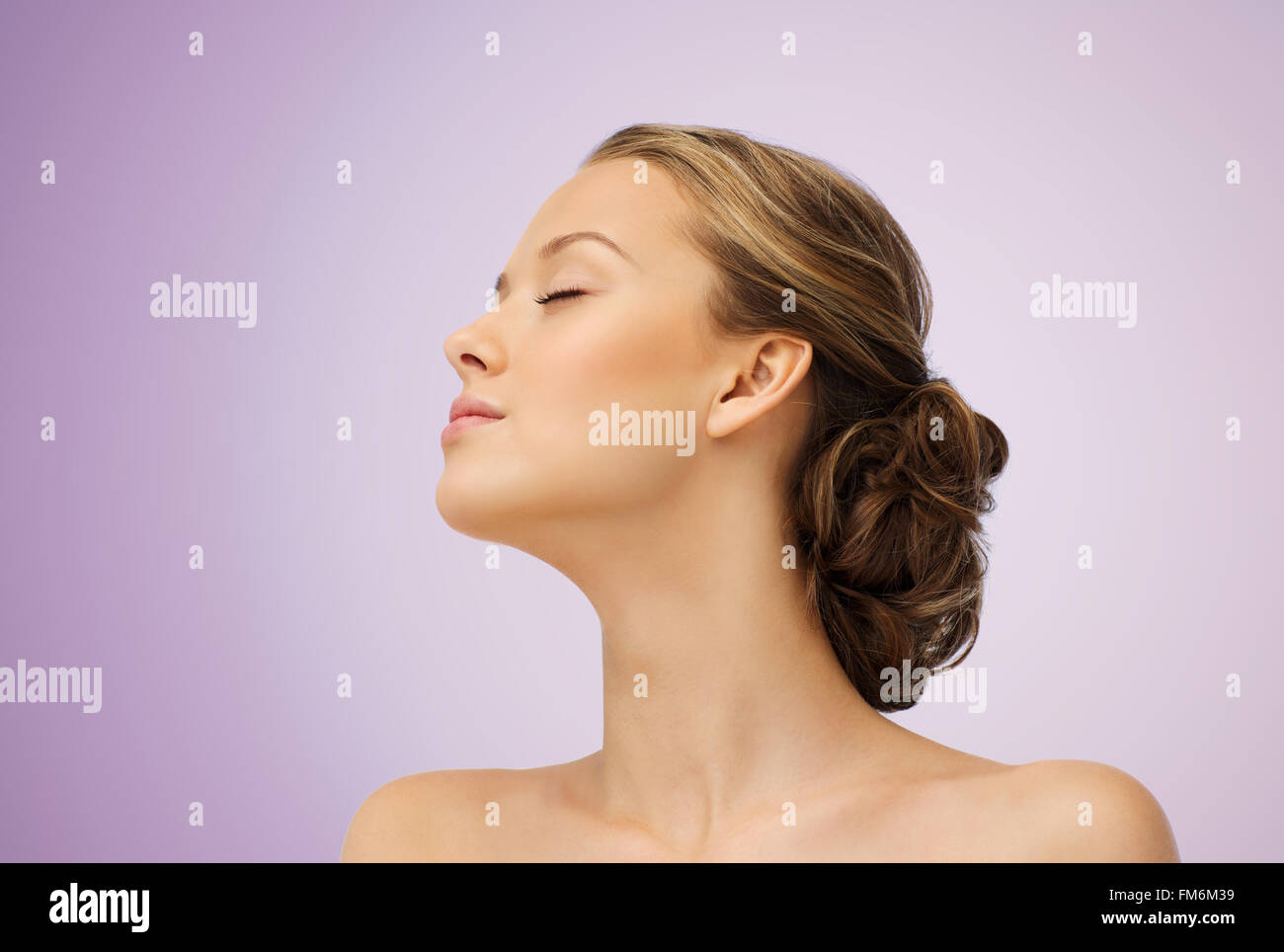 young woman face side view and shoulders Stock Photo