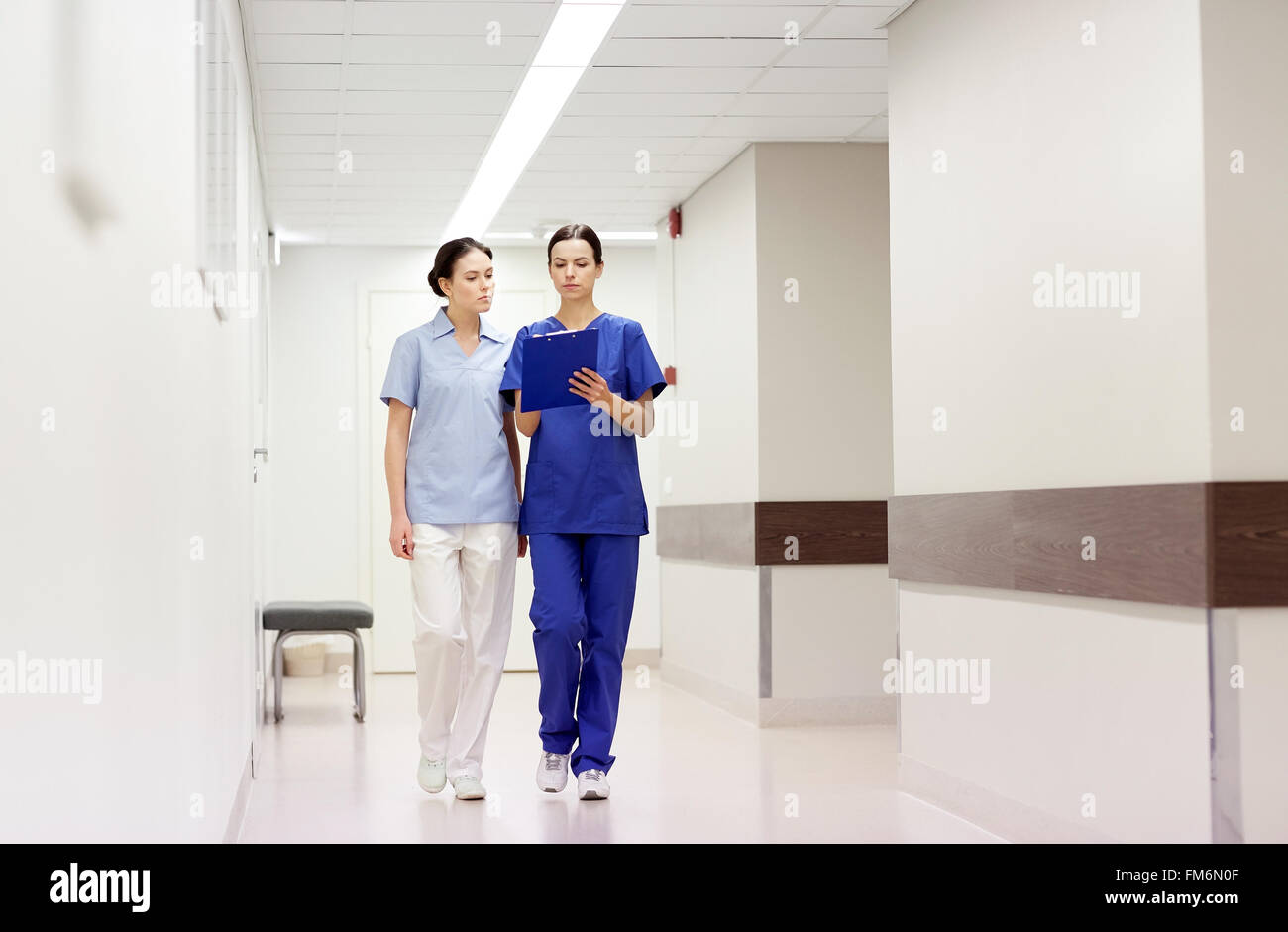 Two nurses with notes hi-res stock photography and images - Alamy