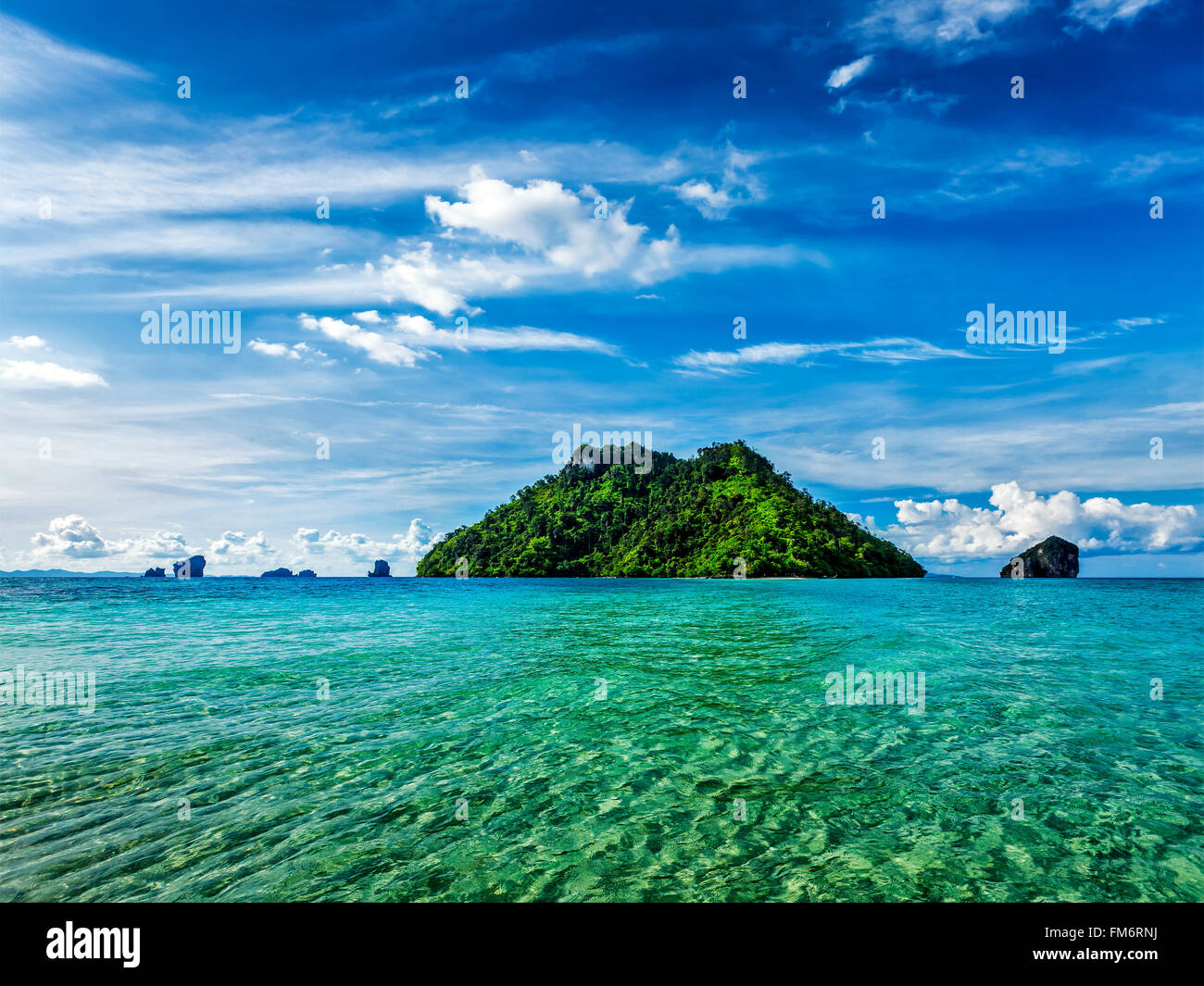 Tropical island in sea Stock Photo - Alamy