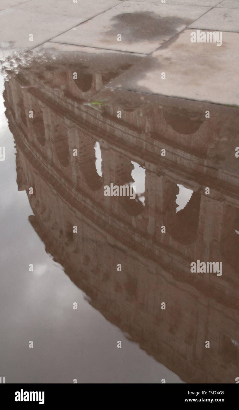 The Colosseum reflected in a puddle, Rome, Italy Stock Photo - Alamy