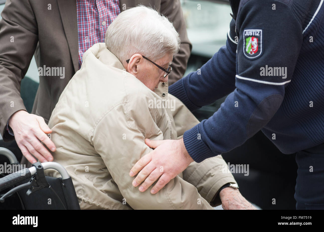Detmold, Germany. 11th Mar, 2016. Defendant Reinhold Hanning arrives for the continuation of his trial in Detmold, Germany, 11 March 2016. Reinhold Hanning, a 94-year-old World War II SS guard is facing a charge of being an accessory to at least 170,000 murders at Auschwitz concentration camp. Prosecutors state that he was a member of the SS 'Totenkopf' (Death's Head) Division and that he was stationed at the Nazi regime's death camp between early 1943 and June 1944. Photo: Bernd Thissen/dpa/Alamy Live News Stock Photo