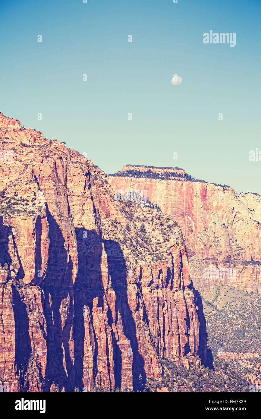 Vintage toned moon over mountains in Zion National Park, Utah, USA. Stock Photo