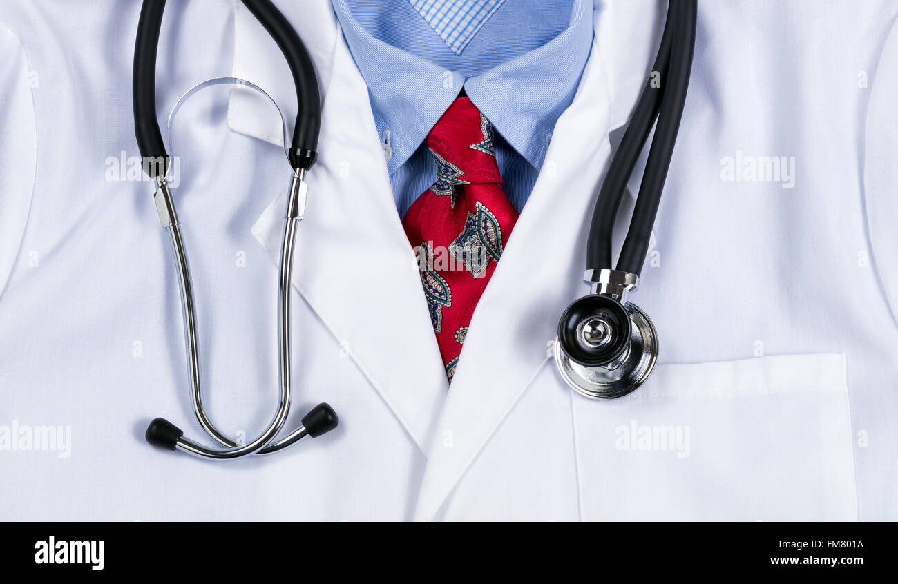 Close up of doctor lab coat with dress shirt, tie and stethoscope Stock Photo