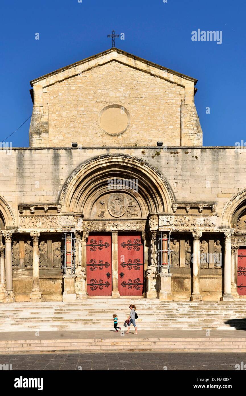 France, Gard, Saint Gilles, 12th-13th century abbey, listed as World Heritage by UNESCO under the road to St Jacques de Compostela in France, Provencal Romanesque style, central portal, tympanum, Christ in majesty surrounded by symbols of the four Stock Photo