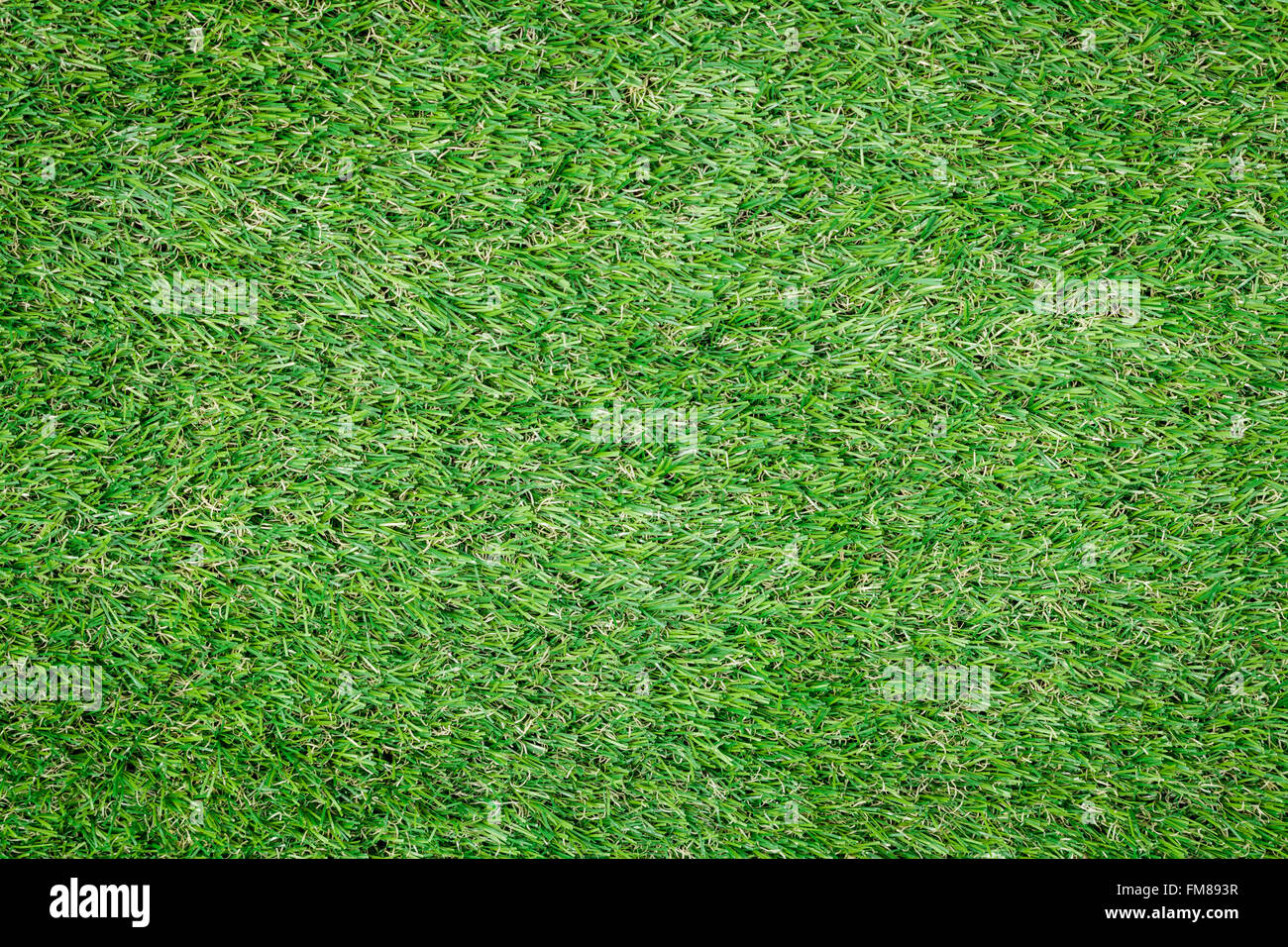 Background texture with fake grass top view. Stock Photo