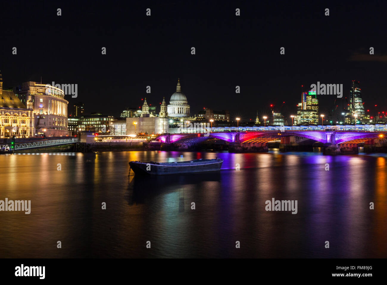 London at night - Blackfriars Bridge and the River Thames, illuminated St Paul's Cathedral in the background Stock Photo