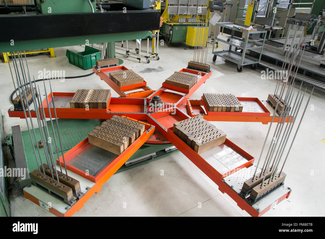 Revolving platform on which the press deposits the aluminum fins. Stock Photo