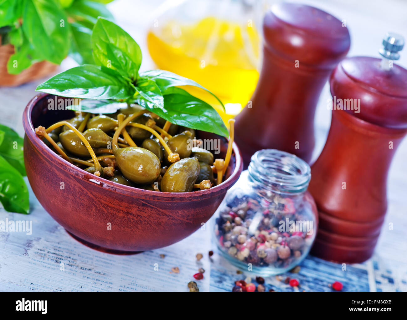 capers with pepper and salt in the bowl Stock Photo Alamy