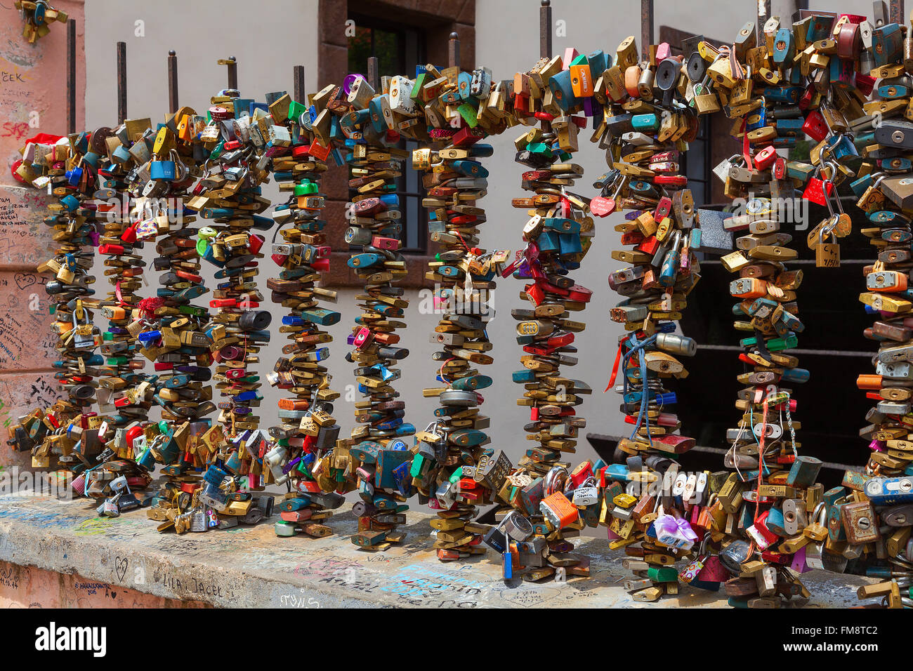 Padlocks attached to railings as a sign of love and affection Stock Photo