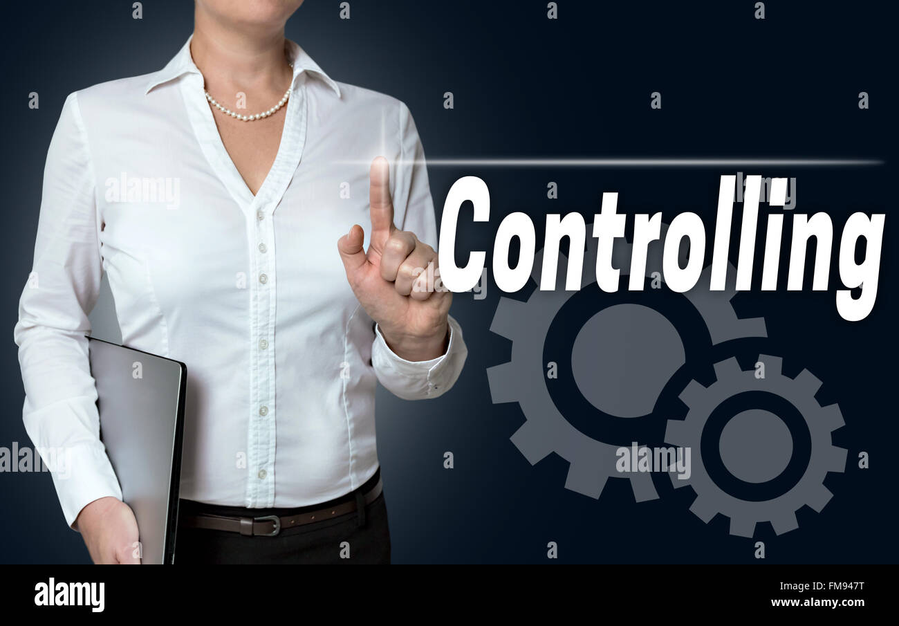controlling touchscreen is served by businesswoman. Stock Photo