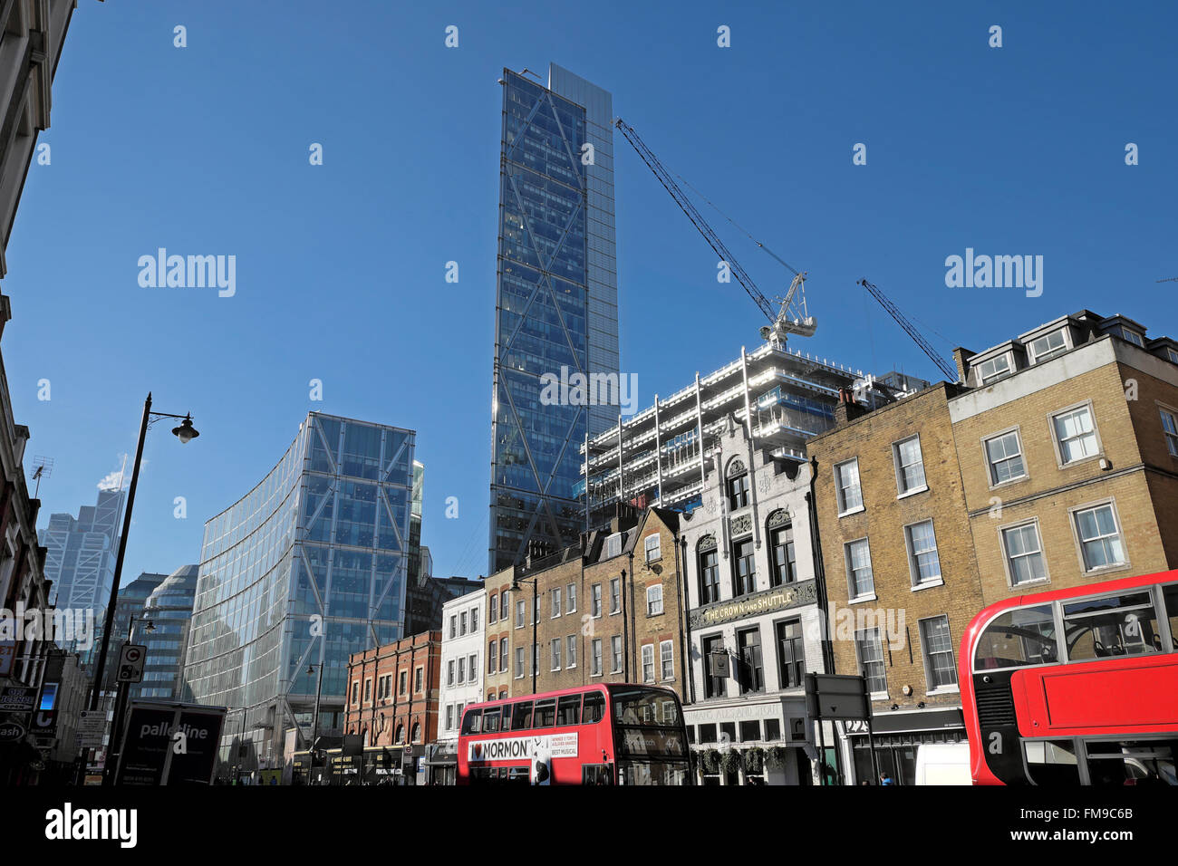 A street scene view of historic and modern buildings from Norton Folgate, Spitalfields London UK  KATHY DEWITT Stock Photo