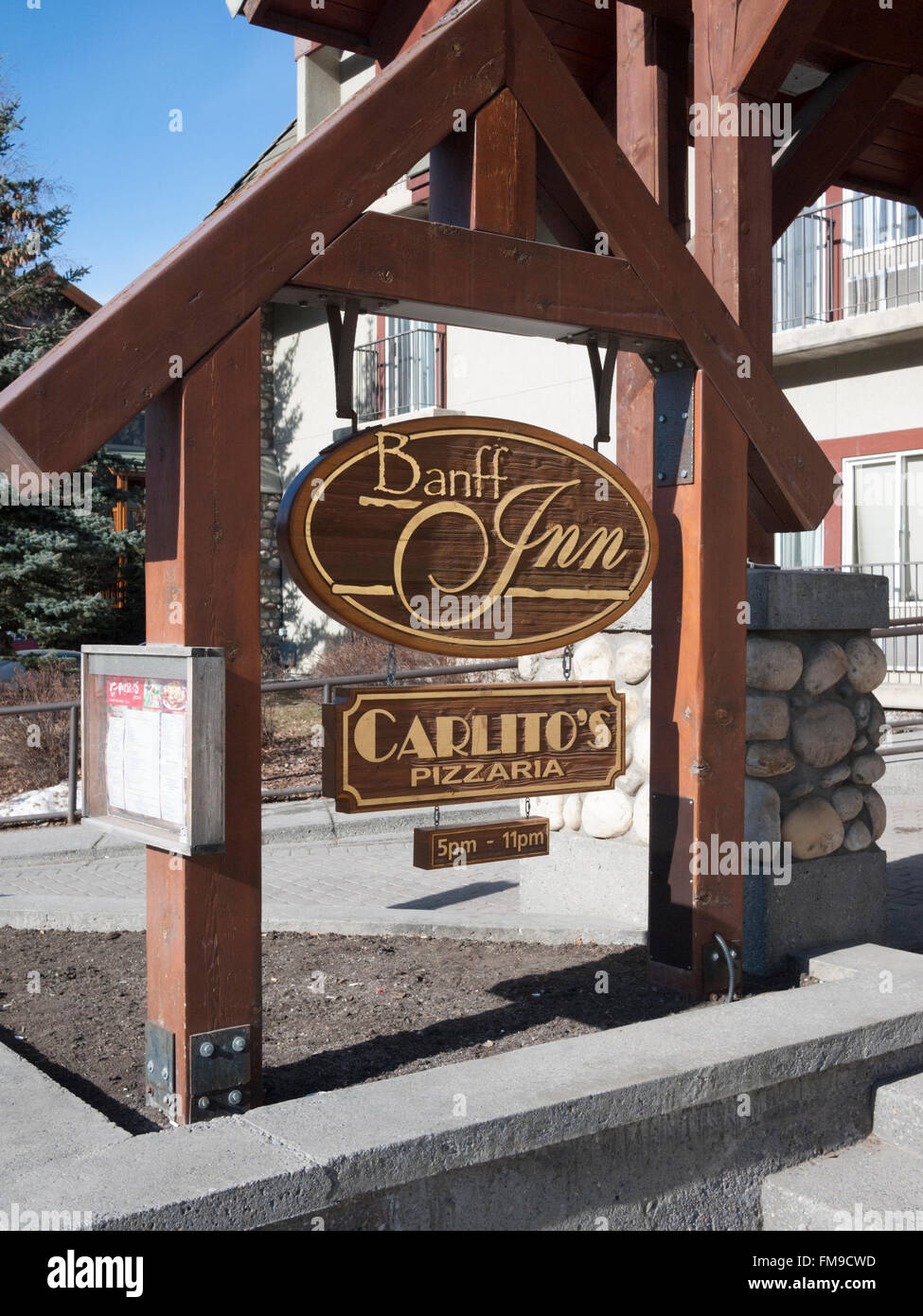 The sign for the Banff in and Carlito's pizzaria Banff Canada Stock Photo
