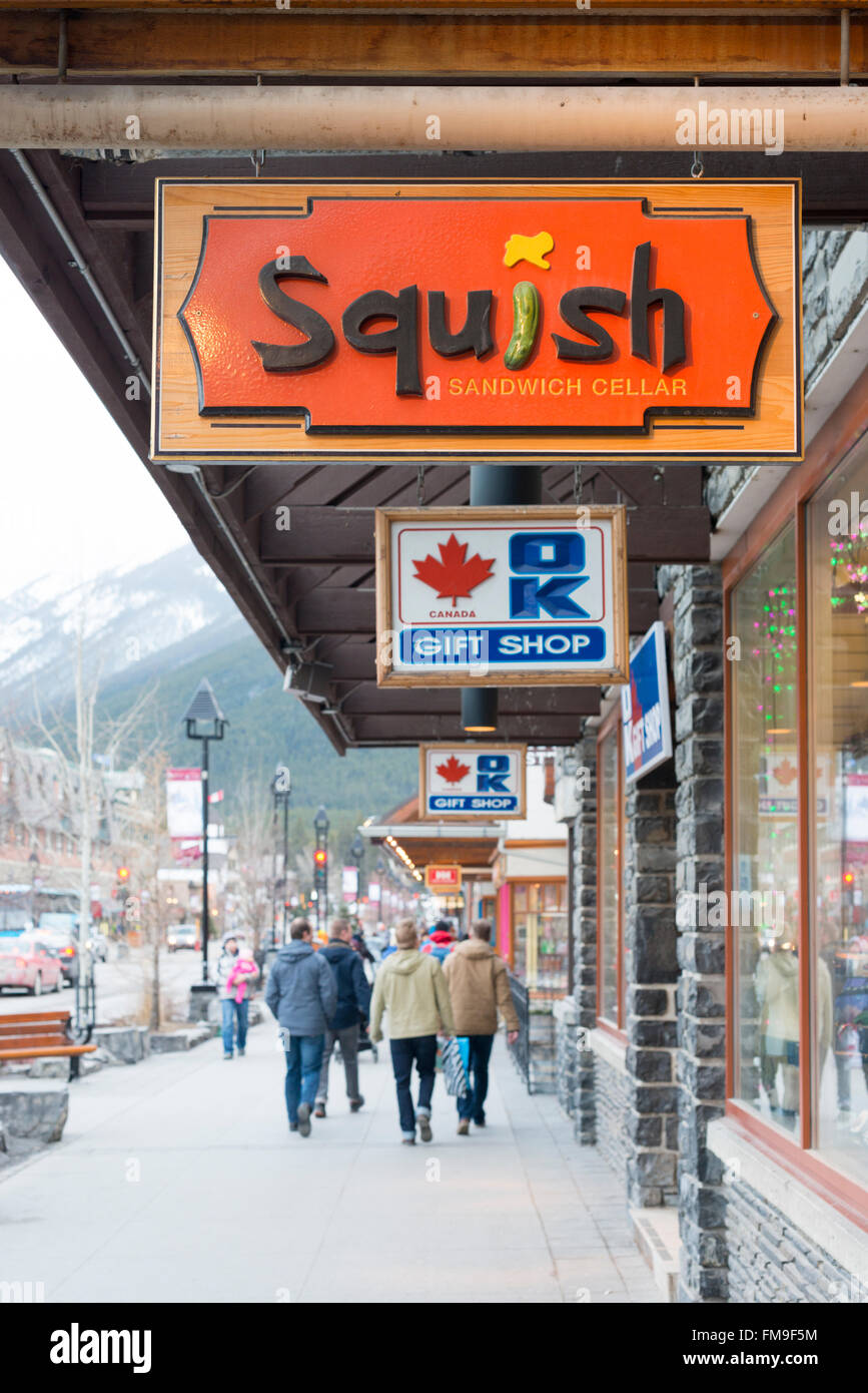 Tourist shops and signs in the main street Banff Avenue Banff Canada Stock Photo