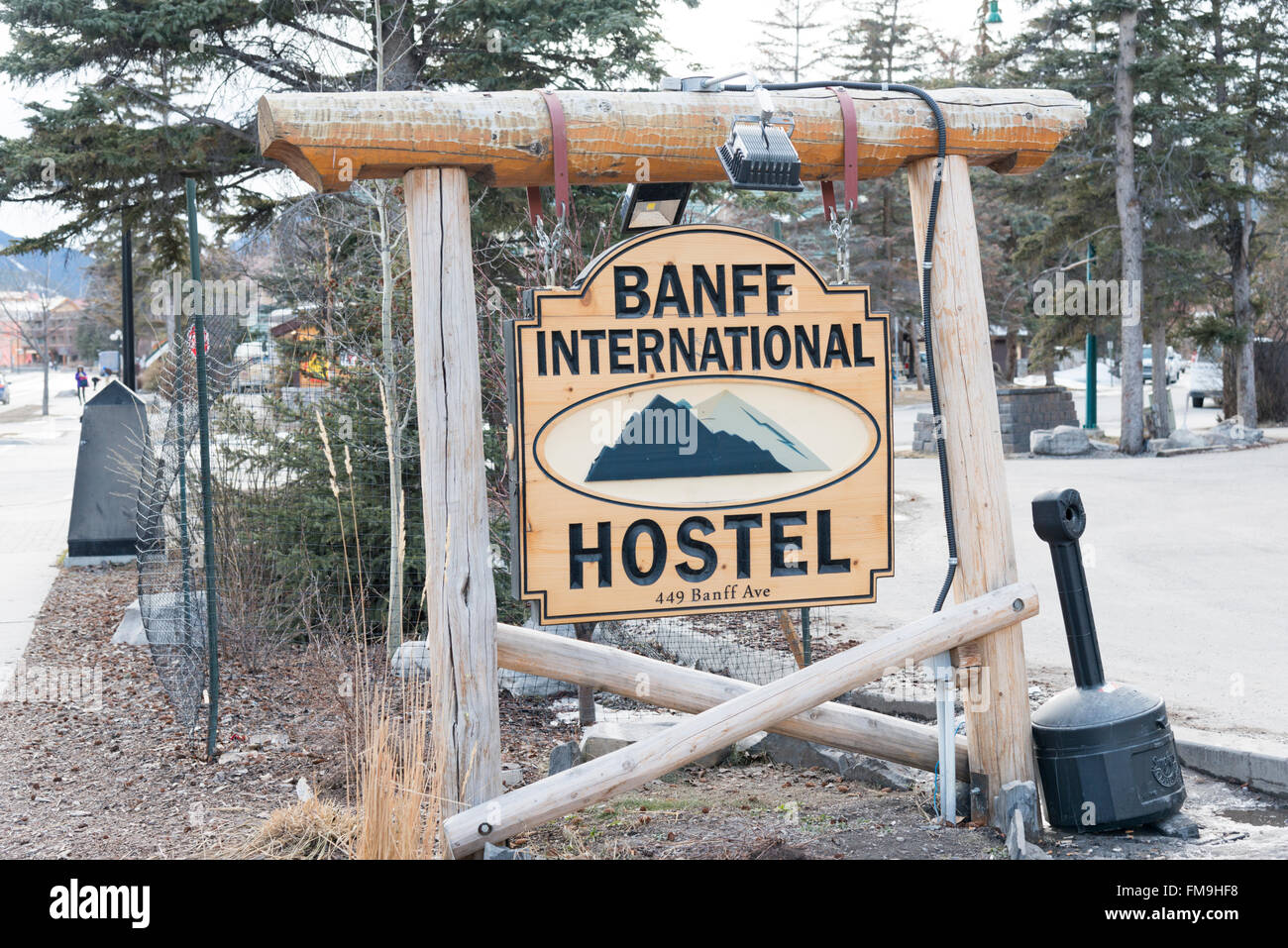 The sign for the Banff International Hostel, Banff Canada in winter Stock Photo